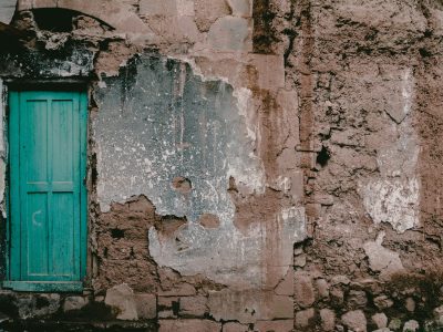 blue wooden 4-panel door